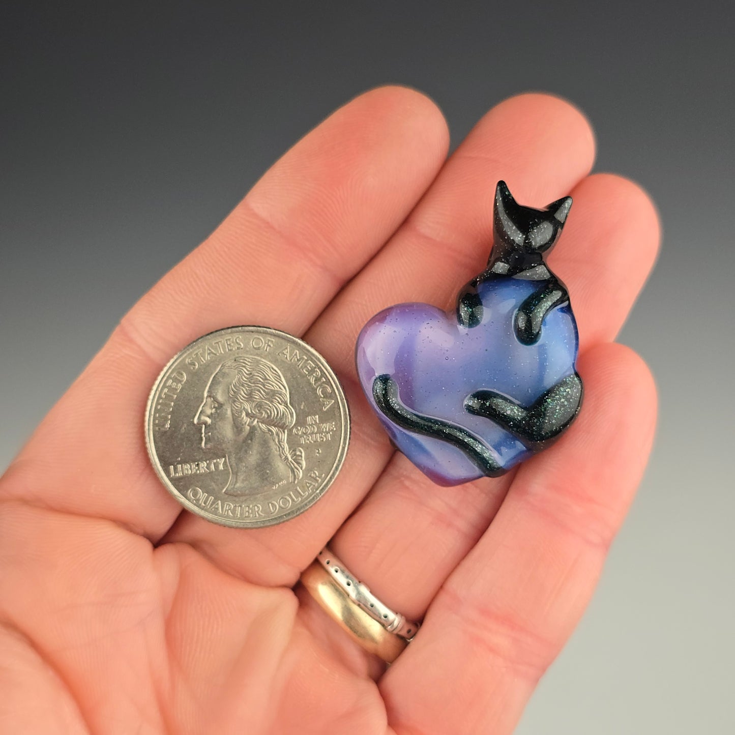 Blue Leprechaun Clingy on a Pink Slyme Heart