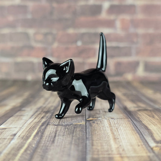 small glass sculpture of a potato cat