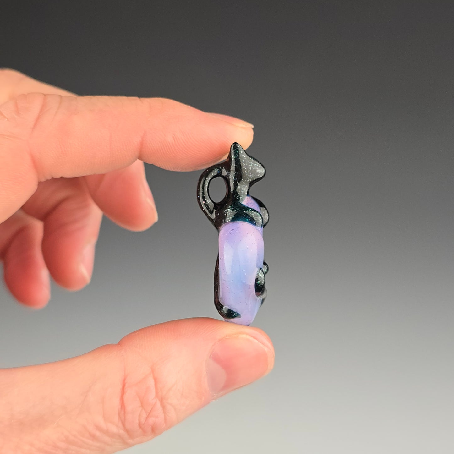 Blue Leprechaun Clingy on a Pink Slyme Heart